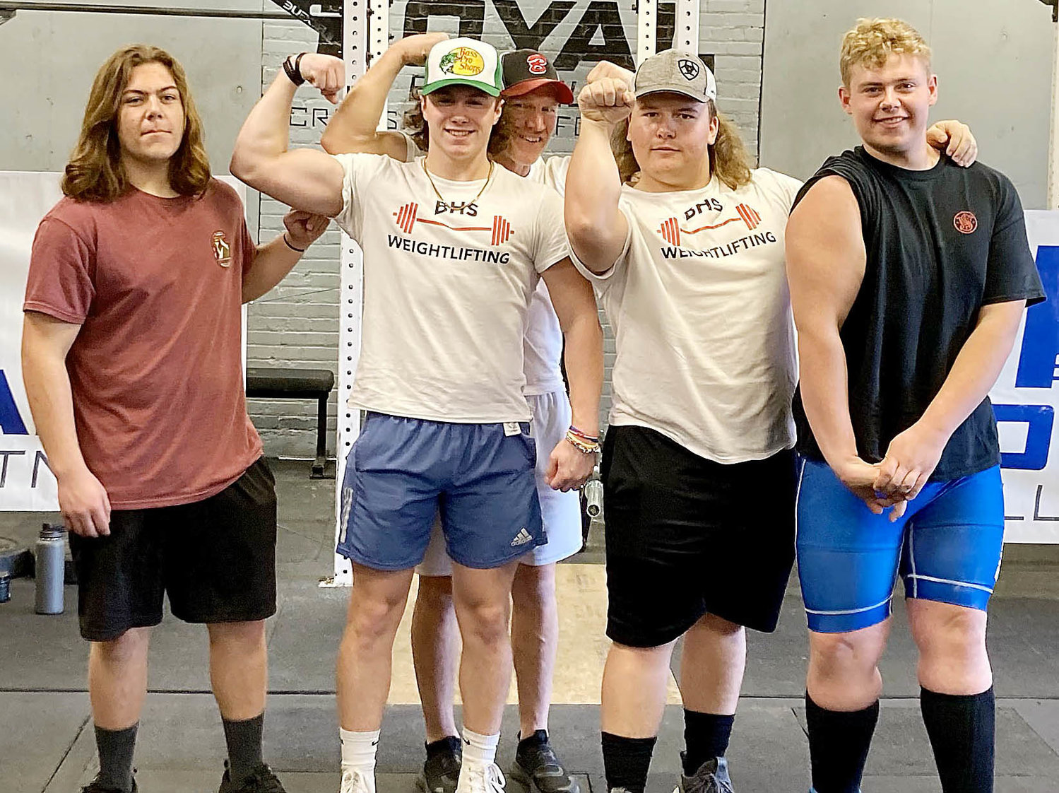 Fellow Tiger weight lifters (from left) from left at an open power lifting meet also in Springfield Saturday included Callen Taylor, Blake Henry, coach Butch Gehlert, Carter Kinkead and Ty Honse.